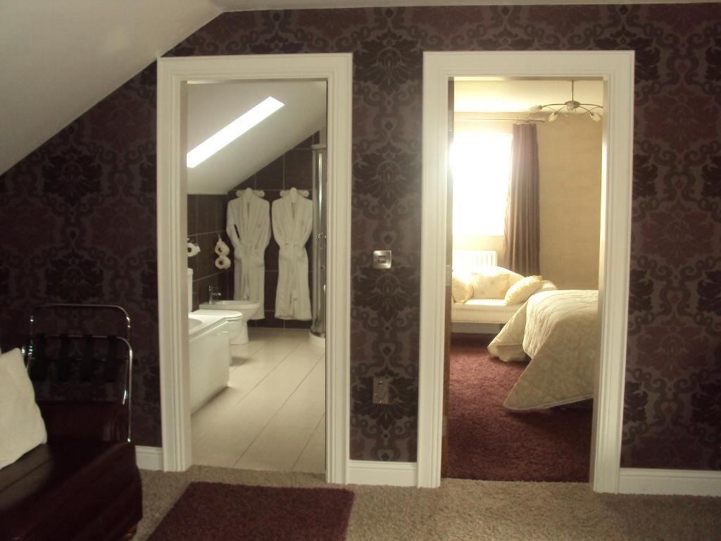 בושמילס Causeway Lodge חדר תמונה