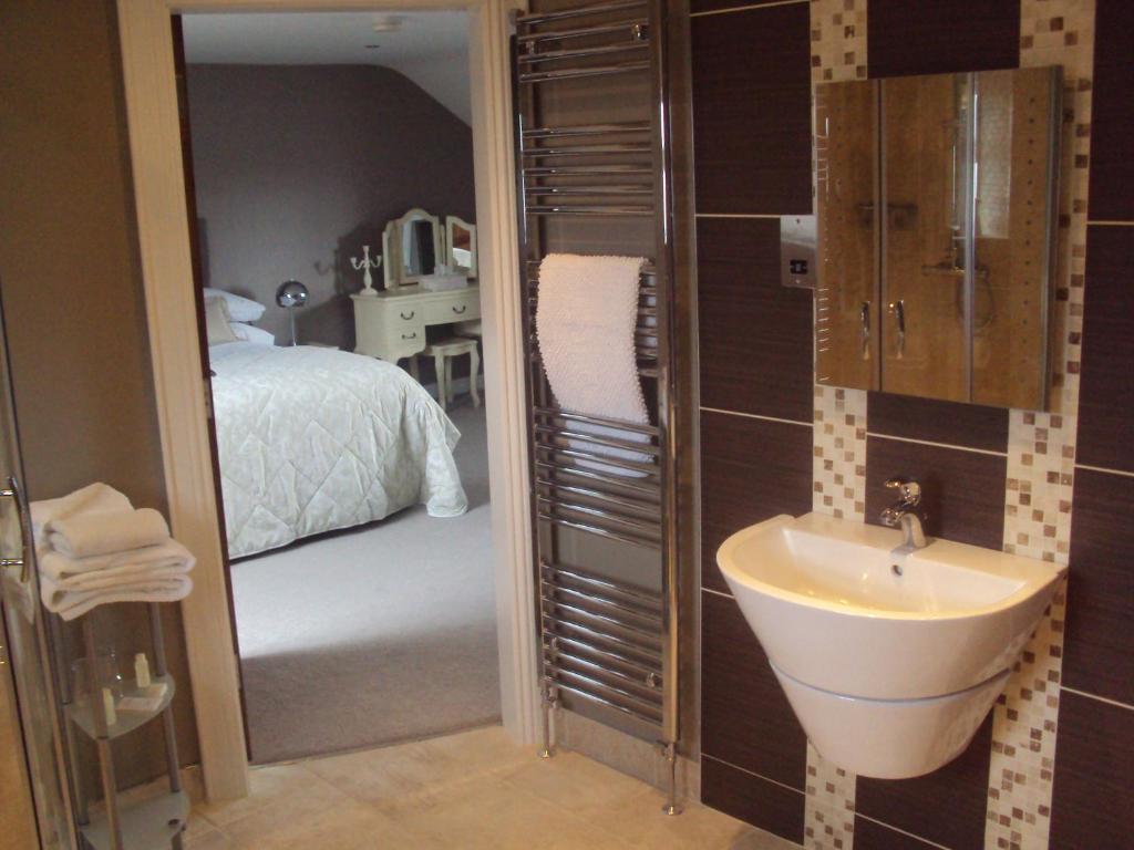 בושמילס Causeway Lodge חדר תמונה
